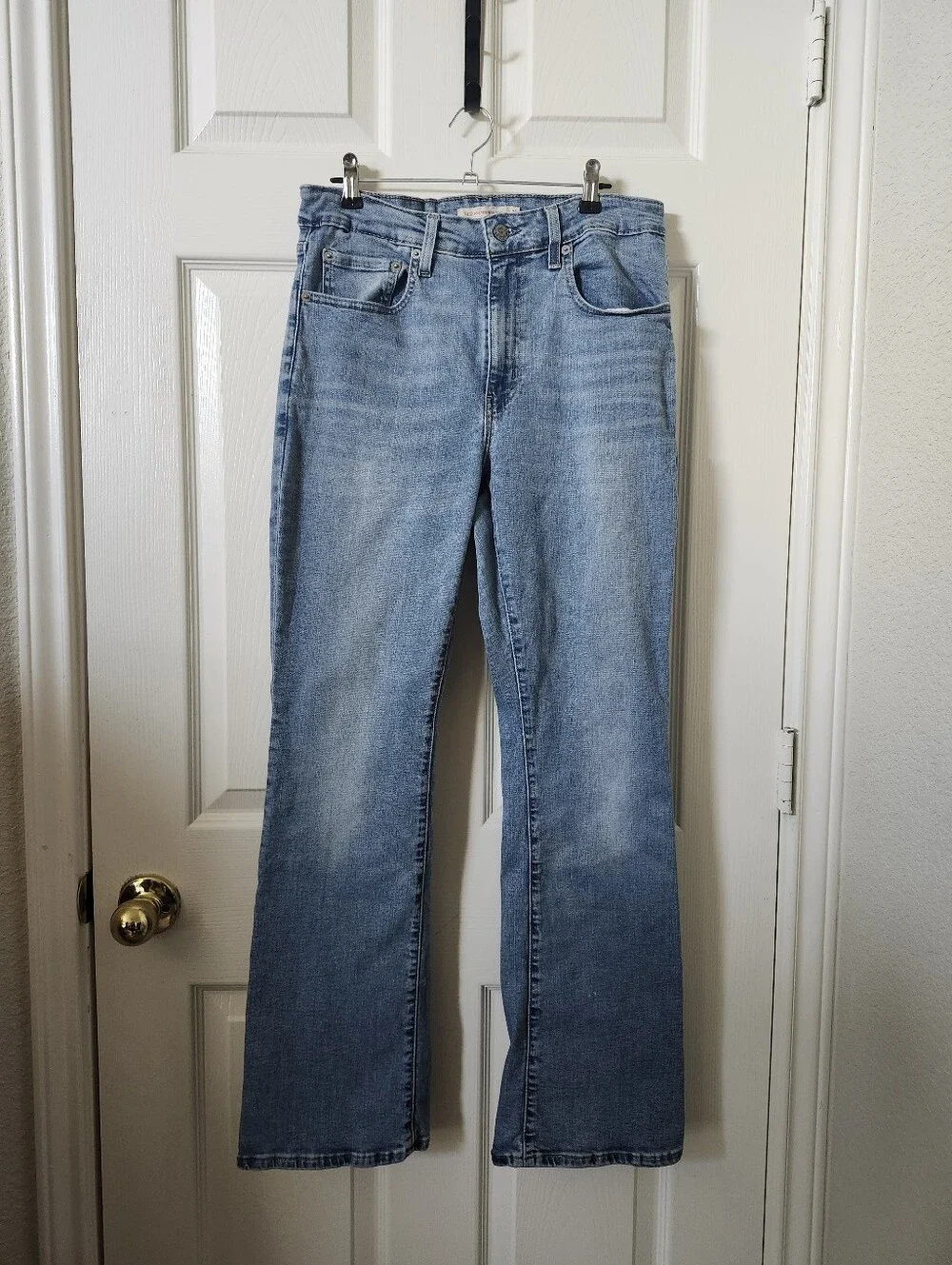 Levis 725 High Rise Bootcut Light Blue Jeans 30